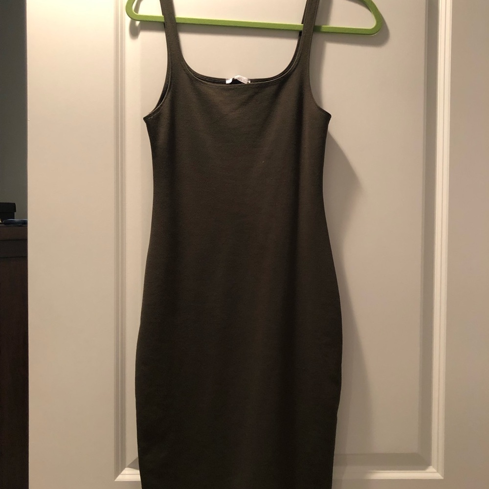 Hunter green tight fitting knee length dress